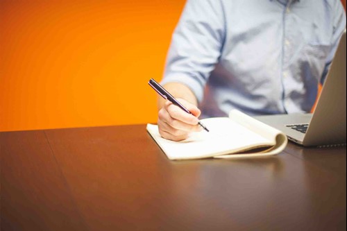 man sitting at desk